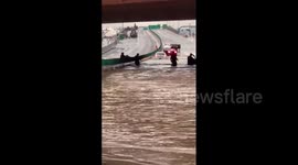 US: Vehicle Gets Stuck On Flooded Highway In Denver, CO After Heavy Rain