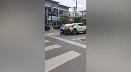 Drunk driver pushes motorcycle he crashed into 300 metres along road in Thailand