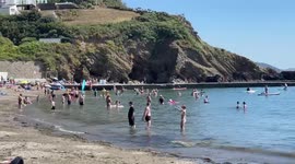 Holidaymakers flock to beach in Cornwall as UK set for another heatwave