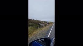 Overturned car on the winding roads of Harris in the hebredies Scotland. Treacherous when it's raining and windy which is most of the time.