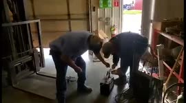 Guy thought he could handle hanging onto a fish shocking device that stuns fish in water