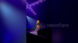 Music fan proposes to childhood sweetheart on stage at Christina Aguilera concert
