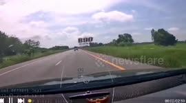 Quick-thinking driver dodges pickup truck hurtling onto road from opposite lane