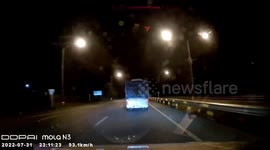Sparks fly across road after truck's rear wheel blows out on highway