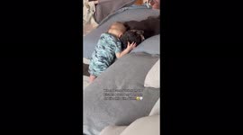 7 month old baby cuddles french bulldog, cutest thing you will ever see!