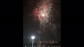 People watching fireworks on Singapore National Day