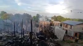 Burmese soldiers 'torch five homes in village before fleeing on boats' in Myanmar