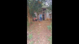 The man fell off the rope swing because it was too heavy