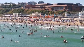 Hundreds flock to Bournemouth beach as heatwave hits the UK