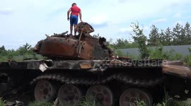 Destroyed Russian tank convoy on Kyiv outskirts becomes tourist attraction