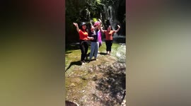 Tourists forced to apologise after stepping barefoot into spring in China