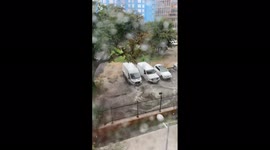 Water gushes out of manhole in Washington, D.C. after heavy rains