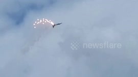 F16 fighter jet shooting flares in the Netherlands