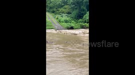 Watch raging flood waters surge through Kentucky after another deluge of rain