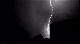 Thunder and lightning strike as monsoon storm approaches in Tucson Arizona.