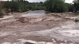 Monsoon rains in Tucson, Arizona floods road