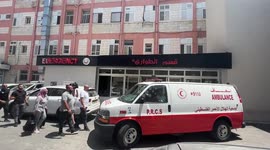 A Palestinian ambulance move the body of of 10-year-old Palestinian girl Lian Al-Shaer who died of her injuries from an Israeli air strike during the Latest Gaza-Israel fighting, from Al-Makassed Hospital in Jerusalem to Gaza strip