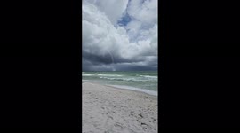 Waterspout forms off beach in Destin, Florida
