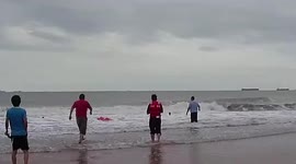 Chinese police officers use robotic lifeboat to save boy from drowning in sea