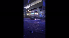 Car drives head-on against flow of raging flood in Las Vegas