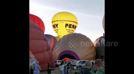 Hundreds gather as hot air balloons rise during Bristol's Balloon Fiesta