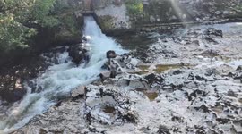 Drought in Yorkshire causes severely low water levels on the River Wharfe at Linton Falls in Grassington in the Yorkshire Dales
