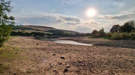 UK heatwave: Low water levels at Peak District reservoir