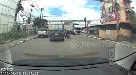 Electricity post and wires collapse onto food delivery truck