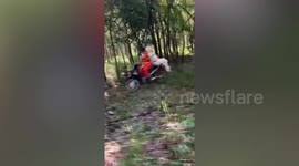 Bizarre moment paramedic has to ride with DEAD MAN strapped to back of motorcycle