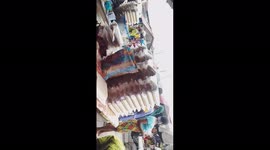 How to hustle in the market when it raining and this video was made in Africa, Ghana.