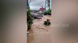 Tropical Storm Mulan swamps homes following heavy rain in northern Thailand