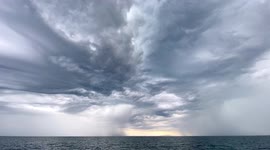 Boat passes through huge rain storm off the coast of Scotland