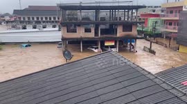 Raging floods flow through homes as Storm Mulan swamps northern Thailand