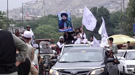 Taliban celebrates one year of taking over Afghanistan with flags and guns