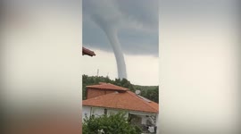 Massive waterspout tornado forms off the coast of Greece
