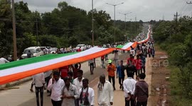 Over 50,000 take part in world record attempt carrying 9km long Indian flag