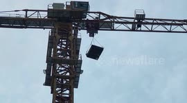 Worker rescued after fainting atop 130-foot-tall crane in eastern China