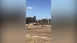 Under 13s football team take cover on pitch as police chase suspect