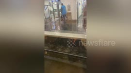 Paris metro station flooded during rainstorm