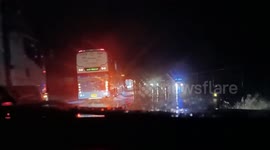 Vehicles stuck in bumper-high flood after heavy rain in Thailand