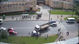 Truck accident - truck crashes into oncoming traffic when trying to pass school bus (CCTV Video)