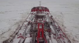 Timelapse video of icebreaker escorting tanker through ice in Russia