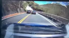 Close call: Mercedes driver almost crashes after overtaking vehicle ahead on a bend (Dashcam Video)