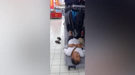 Elderly people lay on supermarket shelves to escape heatwave in central China