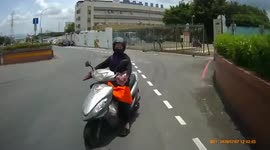 Road rage: clueless moped rider turns into one way road and crashes into other rider (Dashcam Video)