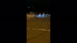 Crazy moment car accidentally drives into crowd during illegal races in Russia