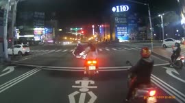 Police chase: oblivious driver skipped through red light next to traffic enforcer (Dashcam Video)