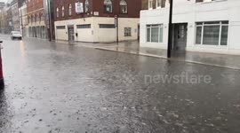 London streets turn into rivers as torrential rain and flash floods hit the capital