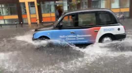 London streets turn into rivers as torrential rain and flash floods hit the capital.