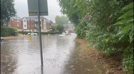 Small Car Drives Through Flood - Extreme Flooding on the B197 in Oaklands, Welwyn Hertfordshire U